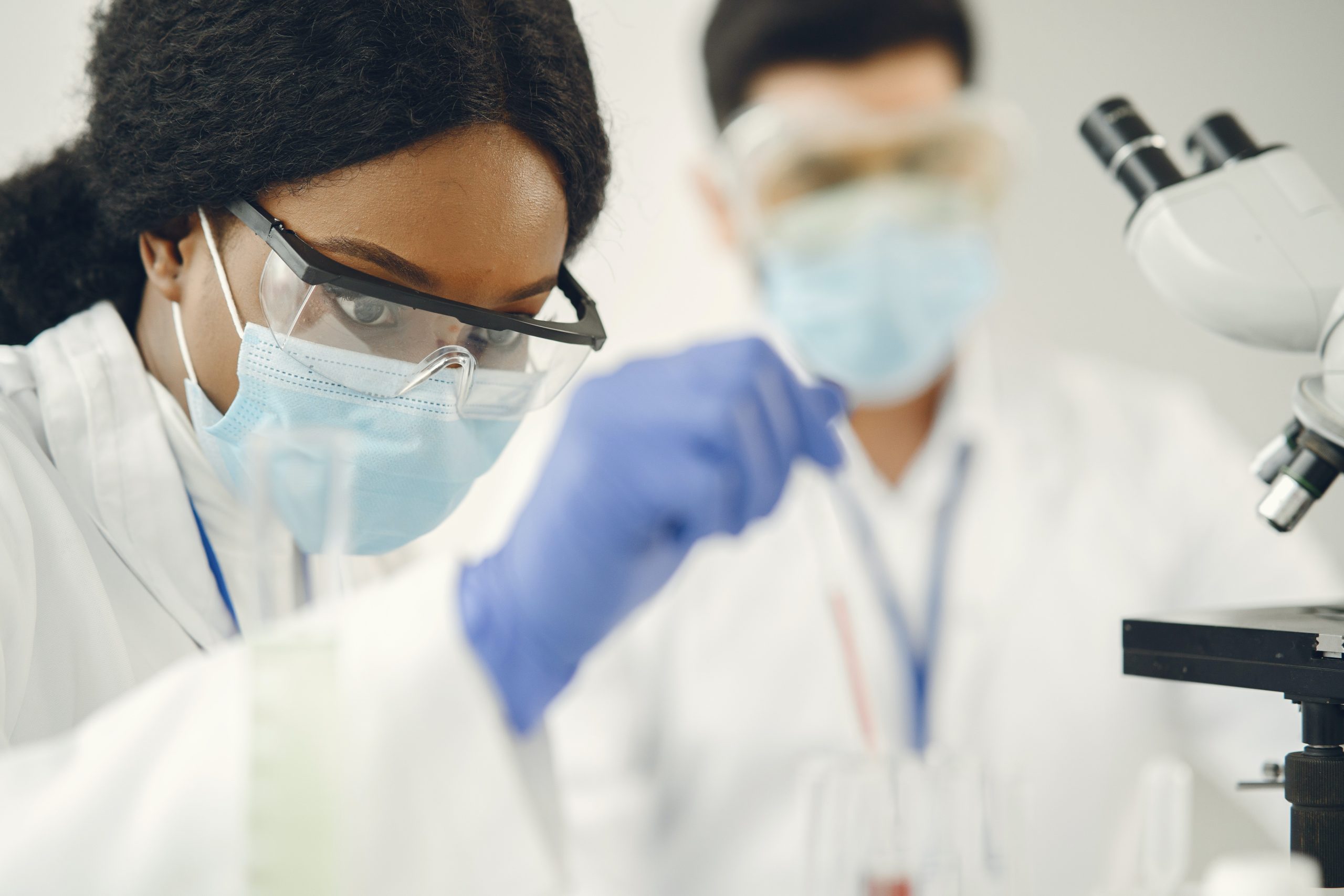 Two scientists researching in a lab.